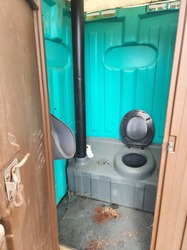 Exterminate, Clean, Fill Tanks with Water and stock with toilet paper, etc. in Poly-Portables - $150 Value