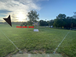 Freedom Field: Outfield Fence  (Chain link fabric)