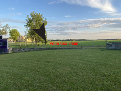 Montesquieu Field: Outfield Fence  (Chain link fabric)